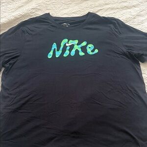 Nike Men's Navy Blue Tee with Green Logo